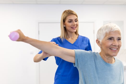 Professional therapists is stretching muscles, senior patient with abnormal muscular symptoms, physical rehabilitation therapies and treatment of physiological disorders by physiotherapists concept. photo