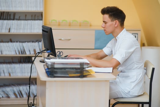 Portrait smiling doctor at office photo