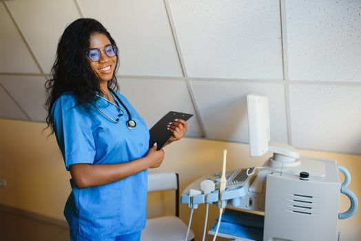 attractive female african american medical professional in office photo