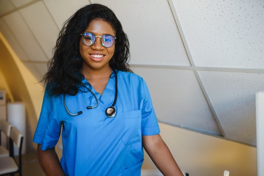 attractive female african american medical professional in office photo