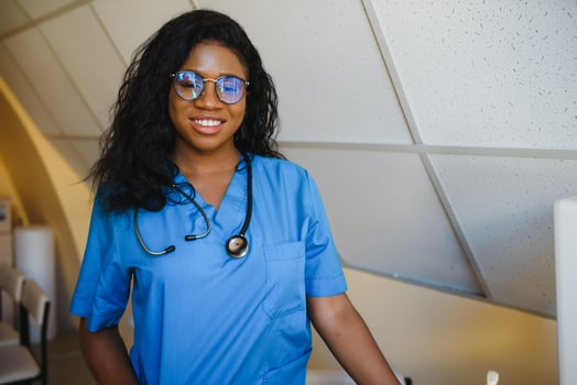 portrait of african female doctor at workplace photo