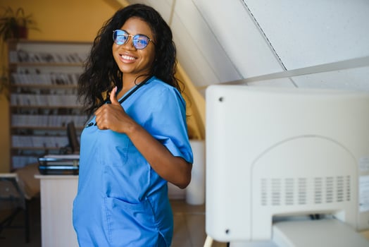 portrait of african female doctor at workplace photo