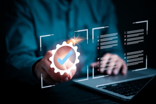 person holds a glowing check mark symbol, representing approval, confirmation, or successful verification of quality control. data business service assurance and marketing concept. photo
