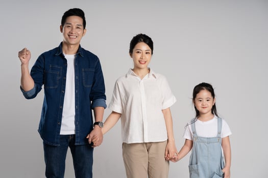 Asian family portrait posing on white background photo