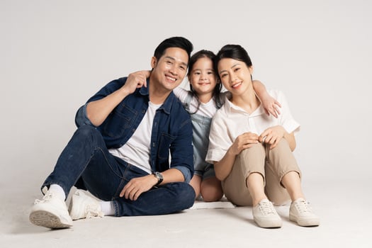 Asian family portrait posing on white background photo