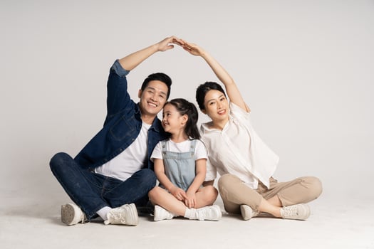 Asian family portrait posing on white background photo