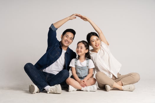Asian family portrait posing on white background photo