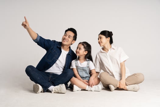 Asian family portrait posing on white background photo