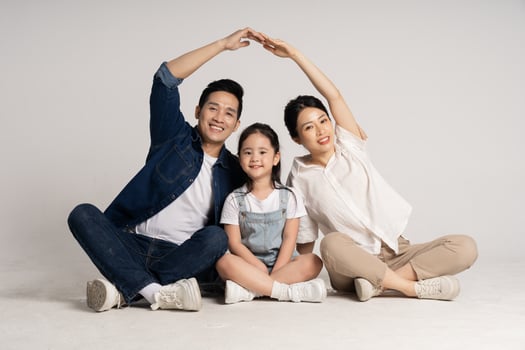 Asian family portrait posing on white background photo