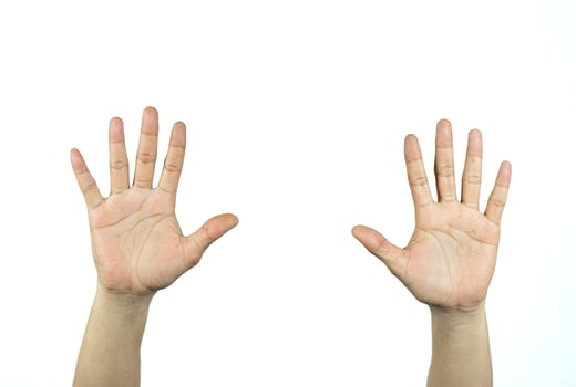 two raised men's hands isolated on white background photo