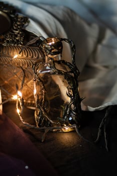 Decorative magic bottle with lights with vines photo