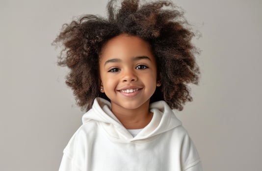 AI generated Young Girl With Curly Hair in White Hoodie photo
