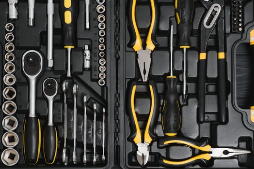 Set of tools for car repair in box, closeup. photo