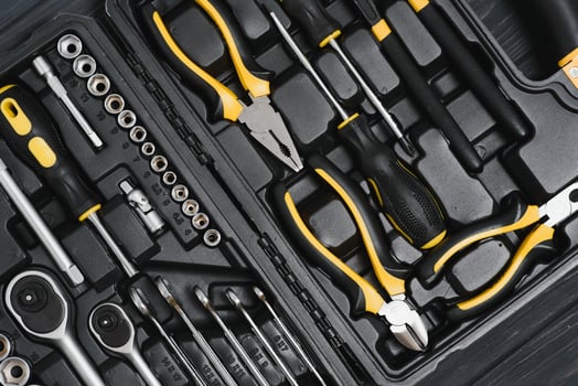 Set of tools for car repair in box, closeup. photo