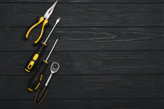 Set of hand tools . Equipment on wooden background. photo