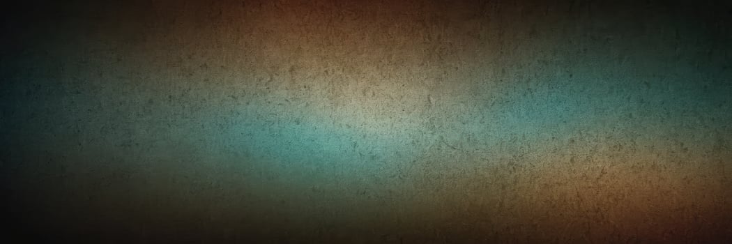 A concrete wall, shabby, old, with glints of light. Background wall with blue and orange light. Slight Vignetting. photo