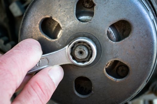 Automobile repair. Repairman working. photo
