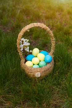 Paint eggs for Easter, bright Easter holiday, children paint eggs, colored eggs in a basket, colored eggs on a stand, Holiday background photo