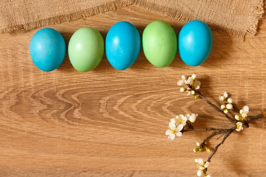Paint eggs for Easter, bright Easter holiday, children paint eggs, colored eggs in a basket, colored eggs on a stand, Holiday background photo