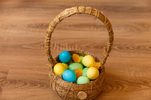 Paint eggs for Easter, bright Easter holiday, children paint eggs, colored eggs in a basket, colored eggs on a stand, Holiday background photo