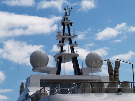 Boston, MA, 2008 - Radar Tower On Motor Yacht Against Blue Sky With Clouds photo