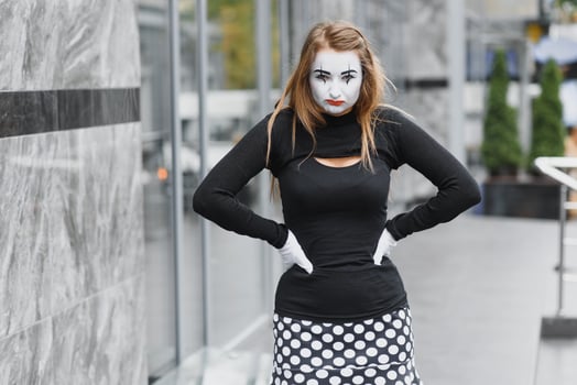 The girl with makeup of the mime. improvisation. mime shows different emotions photo