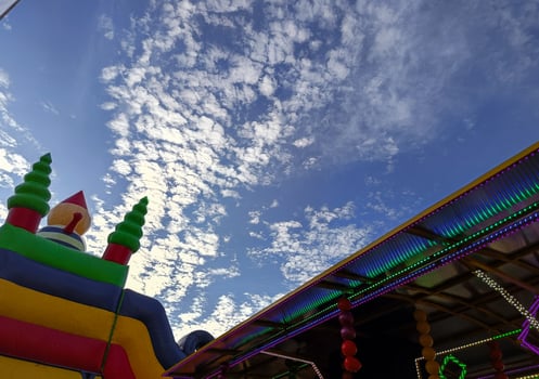 Inflatable plastic slide, low angle photo, sky background photo