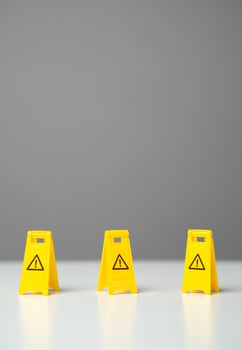 Perimeter warning signs. Be careful. No no zone. Overcome obstacles and forge ahead towards goals. Avoid trouble. Adaptability. Find a way through dangers and risks. Find a safe path. photo