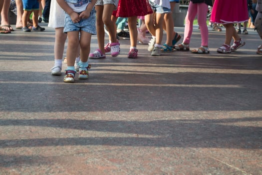 Children's feet one by one. photo