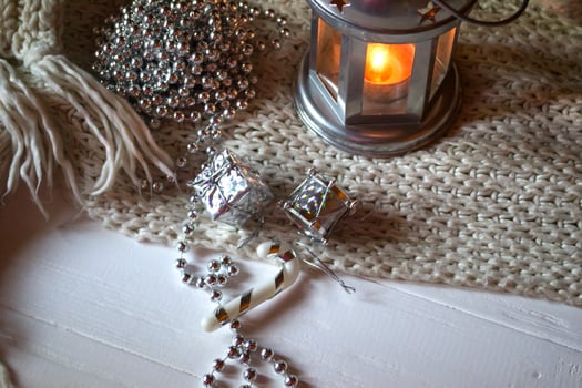 Burning candle and christmas decoration. photo