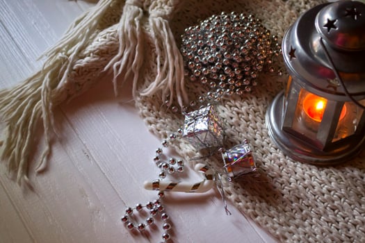 Burning candle and christmas decoration. photo