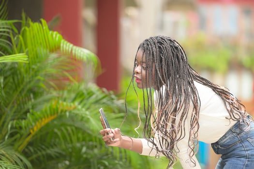 A young woman with his hairstyle and the atmosphere of living in the community. photo