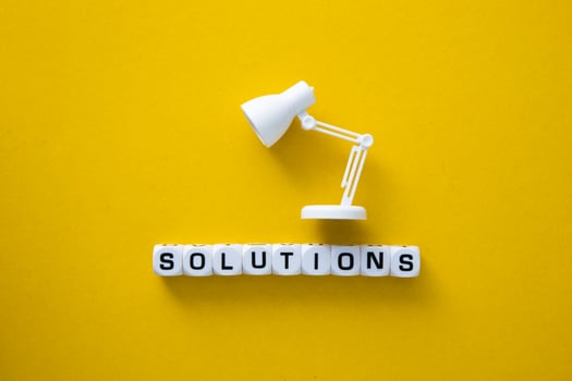 Business concept. Blocks with words 'SOLUTIONS' photo