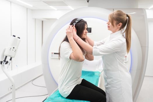 Medical CT or MRI Scan with a patient in the modern hospital laboratory. Interior of radiography department. Technologically advanced equipment in white room. Magnetic resonance diagnostics machine photo