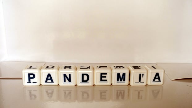 The word pandemic in Italian, Portuguese and Spanish. photo