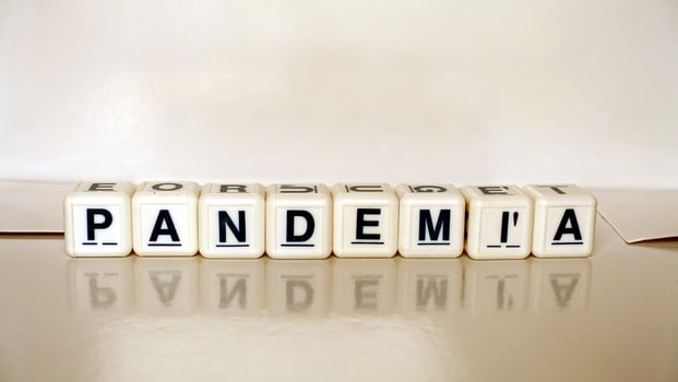 The word pandemic in Italian, Portuguese and Spanish. photo