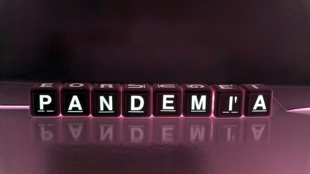 The word pandemic in Italian, Portuguese and Spanish. photo