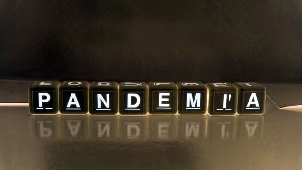 The word pandemic in Italian, Portuguese and Spanish. photo