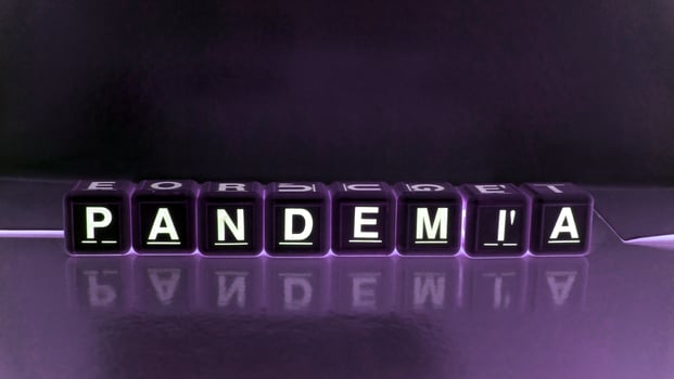 The word pandemic in Italian, Portuguese and Spanish. photo