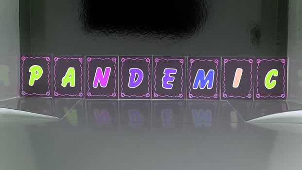 pandemic composed with colored cardboard letters photo