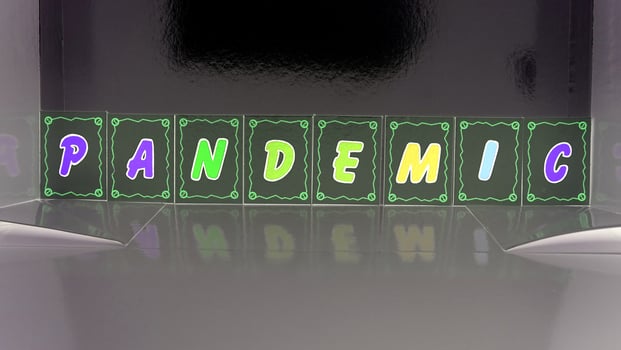 pandemic composed with colored cardboard letters photo