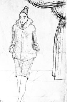 a young woman with fur jacket posing in a theater photo