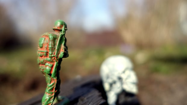 A soldier in war always walks with, together and towards death photo