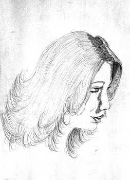 the face of a woman seen in profile photo