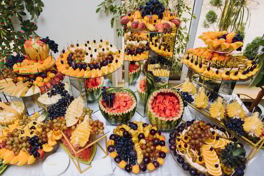 Delicious sweets on wedding candy buffet with desserts, cupcakes,tiramisu and cookies photo