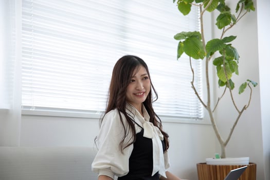 A relaxed Japanese woman by remote work in the home office photo