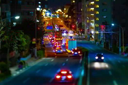 A night miniature traffic jam at the downtown street in Tokyo photo