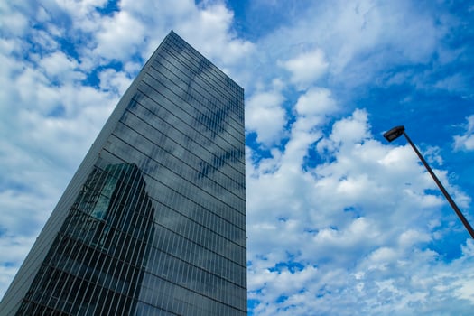 A cloud reflecting the building in the business town wide shot photo