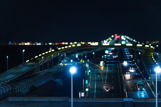 A night miniature traffic jam on the highway at Tokyo bay area photo