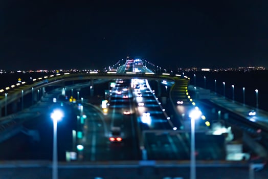 A night miniature traffic jam on the highway at Tokyo bay area photo